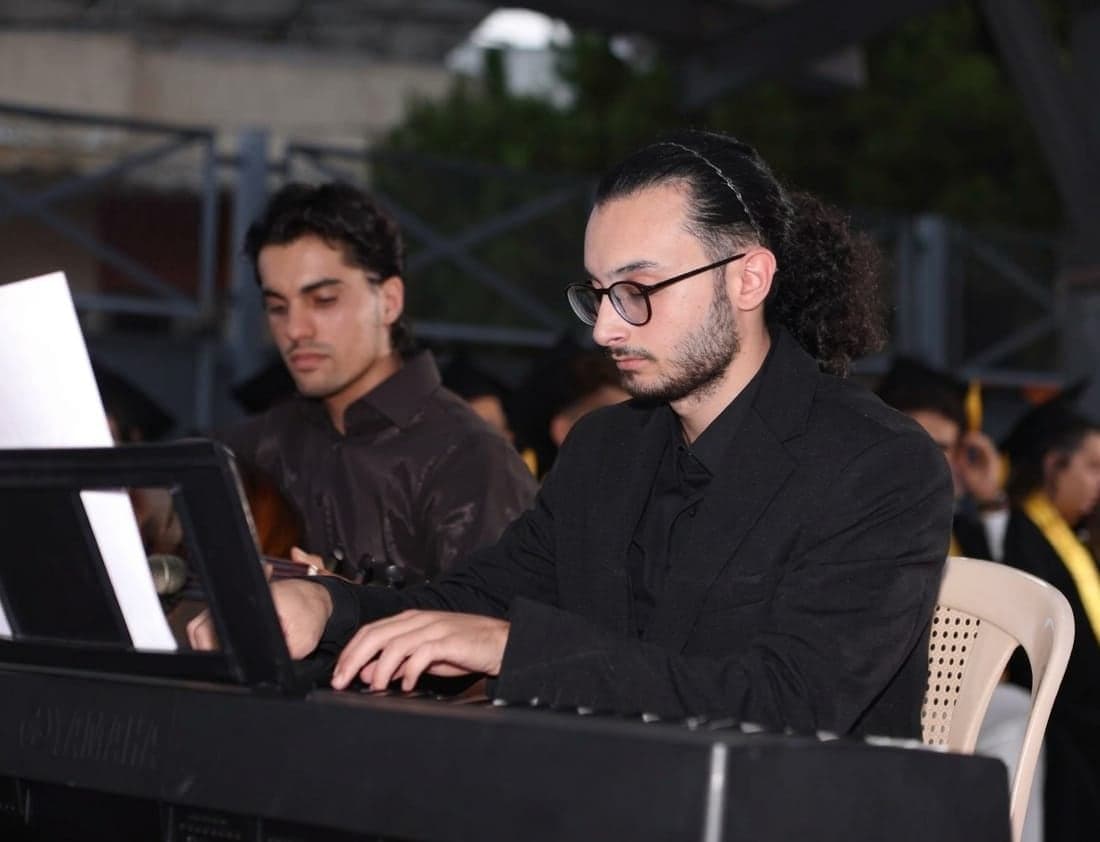 Safi Aridi at the keyboard during a concert
